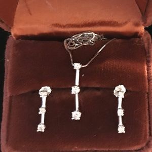 Diamond three stoned necklace and earring set